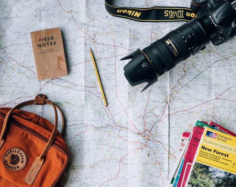 Field travel journal, route planning documents, and testing equipment